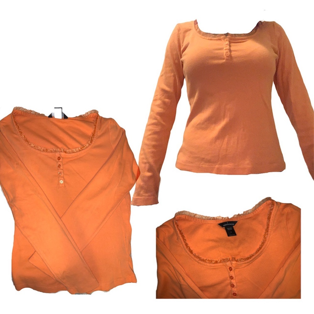 orange long sleeve button up shirt with ruffles
